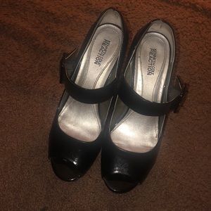 Black KCR heels with a strap